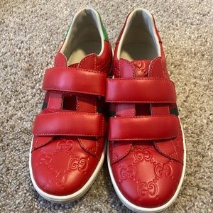 Unisex red authentic Gucci sneakers